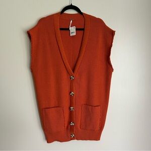 New with tags Free People Sweater Vest Orange Rust size Large